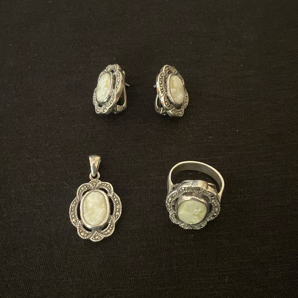 Vintage cameo set. Silver earrings, ring and pendant. Sold as set.